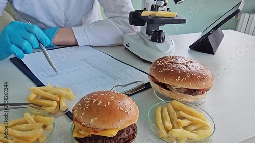 Examining fast food items at a laboratory with focus on quality and safety checks