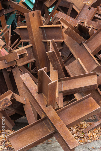 A scrap metal dump of rusty metal beams