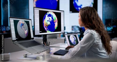 Photography Young Female Meteorologist Analyzes Weather Maps