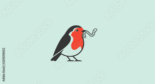 European robin bird holding a worm in its beak.