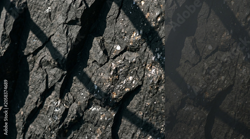 Abstract Dark Rock Texture with Sunlight and Geometric Shadows