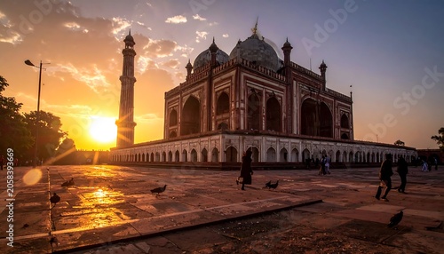 Historic Mughal Mausoleum Glowing at Sunset in Wide Stone Courtyard