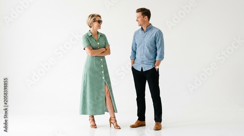 Couple standing together man and woman in casual clothes