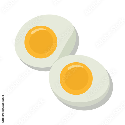 Two halves of a hard boiled egg with bright yellow yolks