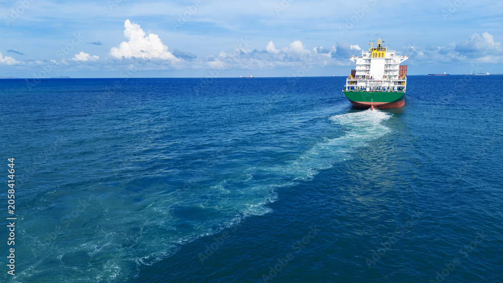 Obraz premium Propeller of large ship underwater spinning power working and water splash contrail . Close up image detail of Propeller ship, Logistics Transportation industry express technology of ship. Freight