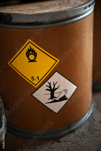 Hazardous Chemical Waste Barrel with Oxidizer and Environmental Warning Labels Close Up