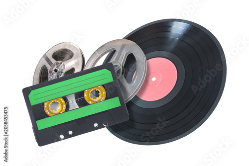 audio cassette bobbin and vynil isolated on white