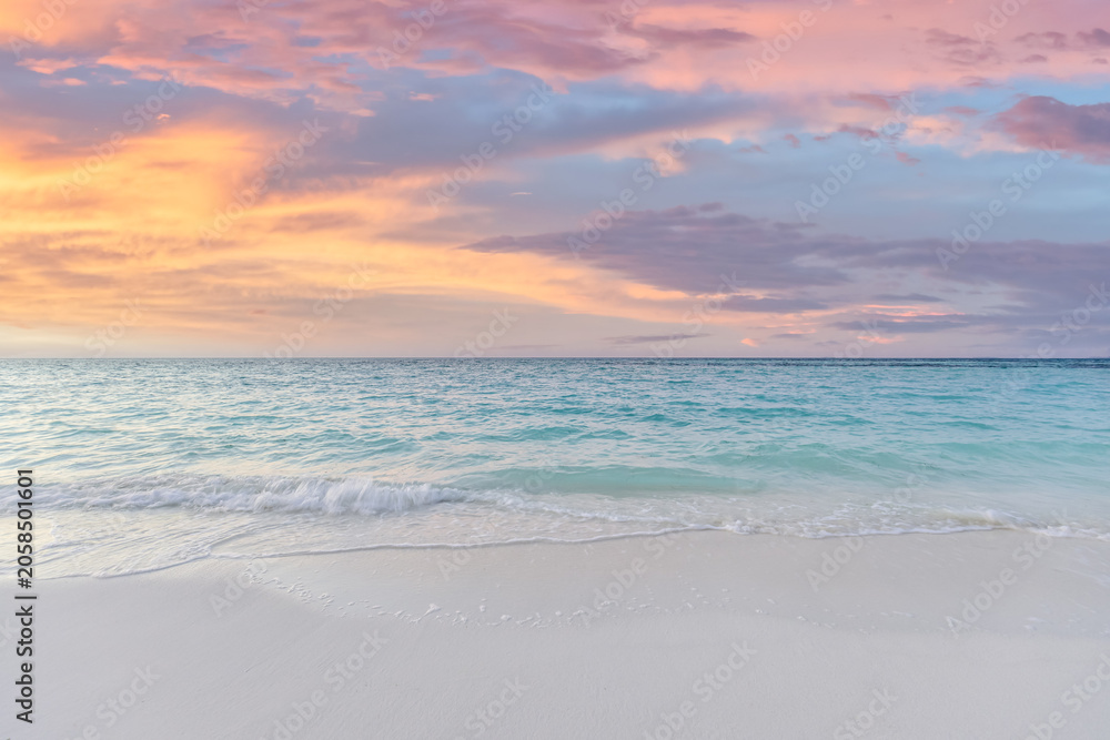 Fototapeta premium Sea sand sky concept, sunset colors clouds, horizon, horizontal background banner. Gorgeous nature landscape, beautiful colors, wonderful sun rays, tropical beach. Mediterranean sunset summer vacation