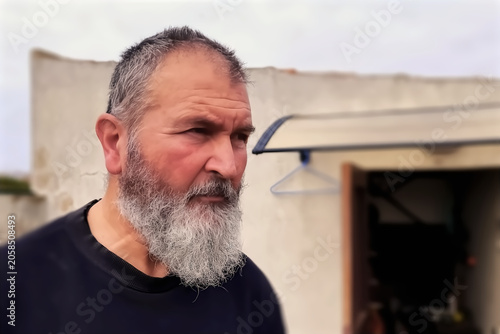 Obraz na plátne Portrait of a senior man with long gray beard