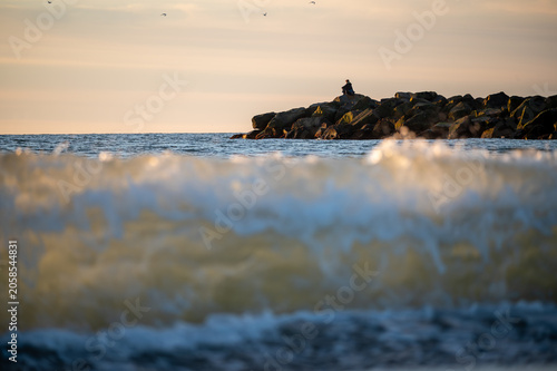 A figure in solitude at Sunset