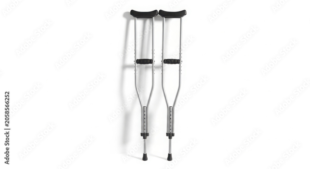 Obraz premium Standard adjustable silver aluminum underarm axillary crutches with black padding for orthopedic injury recovery