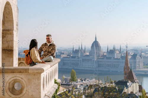 Exploring the scenic views of Budapest with friends on a sunny day