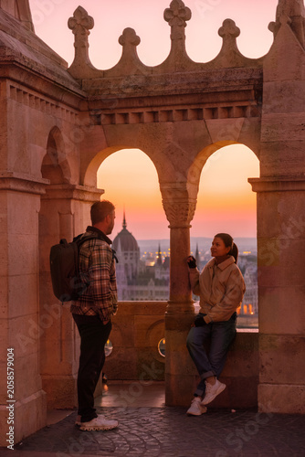 Canvas-taulu Sunset views of Budapest, Hungary, as travelers enjoy a romantic moment together