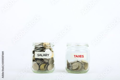 Photos Coins in a Jar Representing Tax Planning and Financial Growth