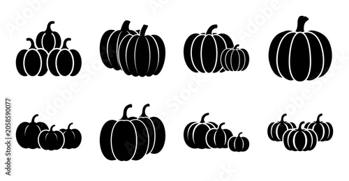 Black pumpkins arranged in a festive pattern - Minimalist vector illustration of black pumpkins grouped in playful clusters, ideal for autumn or Halloween-themed designs.