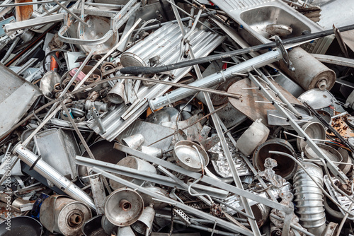 Scrap metal yard with rusted steel piles