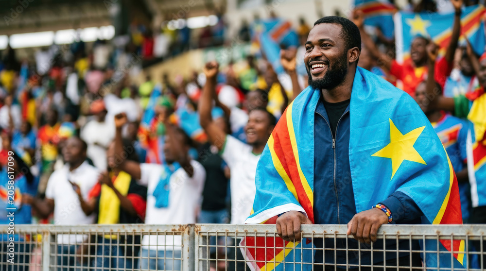 Naklejka premium DR Congo football supporter celebrating in stadium crowd