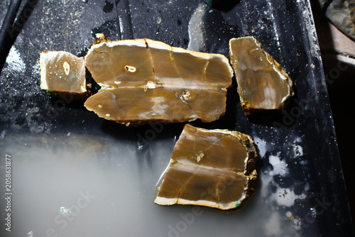 Bilde på lerret Cross-section of a sliced flint nodule revealing textured patterns inside, resti