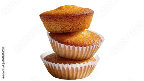 Foto Golden brown baked madeleines stacked in white paper liners, isolated on transpa