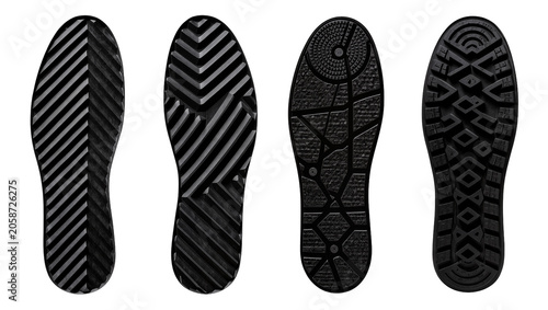 Four black shoe soles with different tread patterns