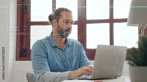 Caucasian man working on a laptop with a digital holographic HUD interface overlay, illustrating software engineering, cyber security, data analysis, and advanced artificial intelligence technology.
