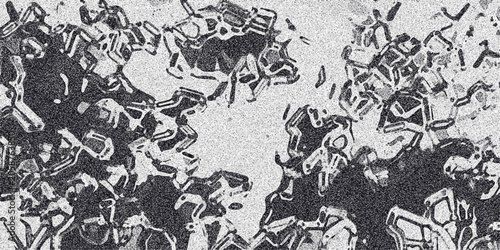 Intricate monochrome abstract pattern with geometric and organic fragmented shapes, resembling cellular structures or crystalline formations for unique backgrounds