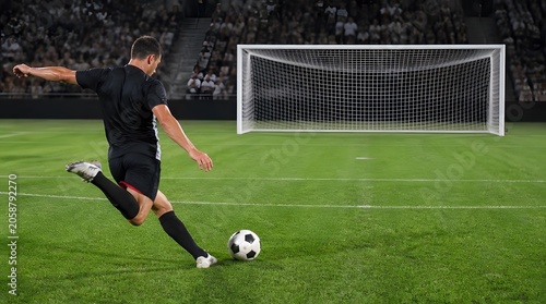 Soccer Player Scores Goal Shooting Ball Towards Empty Net