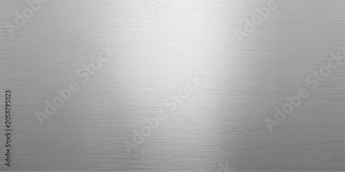Fotografie Brushed metal texture with a subtle sheen, reflecting light with a bright central highlight