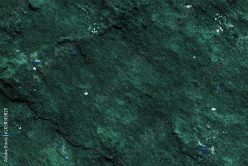 A dark green background with a grungy texture