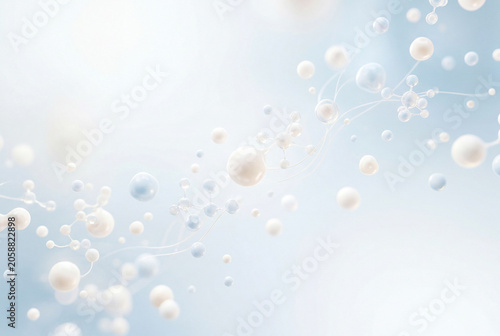 Various clear and white bubbles float in the air against a soft blue background during a creative art session in the studio. Light shines through, adding depth to the scene
