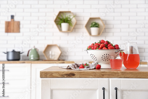 Colander with tasty strawbe...