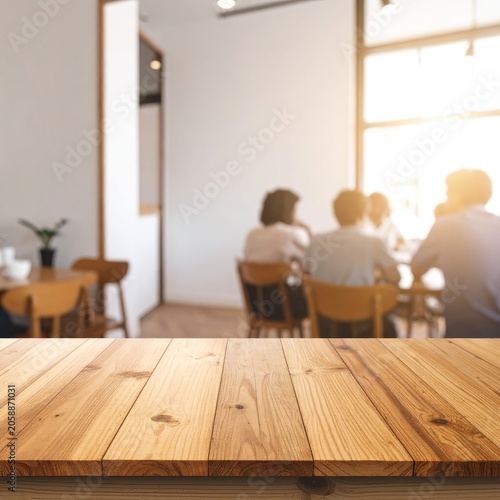 Cozy Cafe Interior with Blurred Patrons Enjoying Coffee and Conversation.