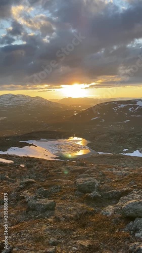 Arctic mountain landscape during Midsummer sunset in Lapland Finland
