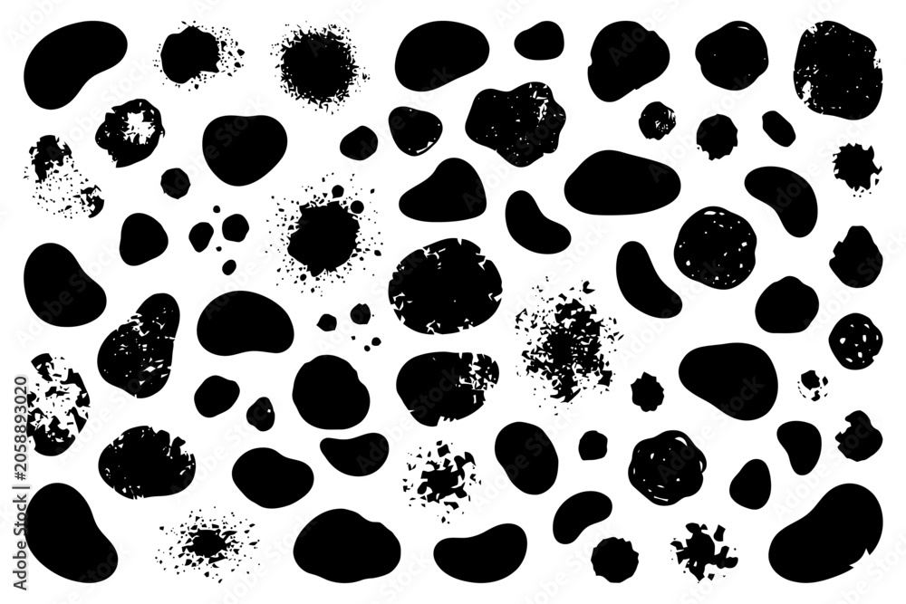 Fototapeta premium Abstract black ink blots and splashes on white background.