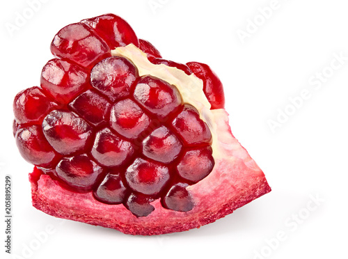 piece of pomegranate with seeds isolated on a white background. clipping path