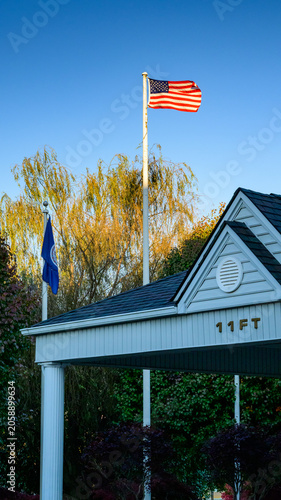 A classic American flag flying against a clear blue sky. Virginia, USA