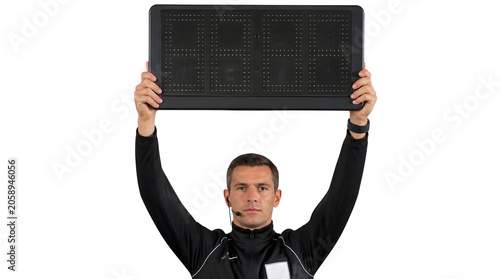 Soccer Referee Holds Up Substitute Board for Player Change