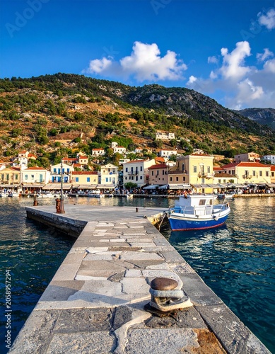Coastal village with harbor and boat