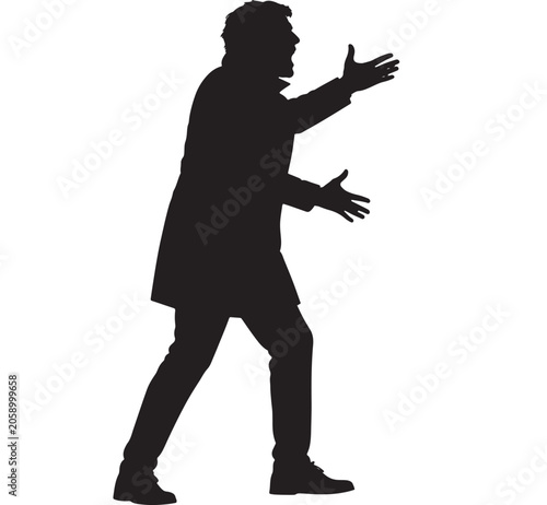 Coach standing on the sidelines shouts instructions to his team with an expressive and energetic posture.