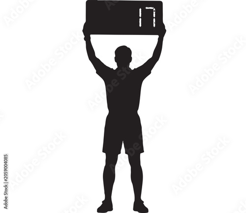 Referee holds up a digital substitution board displaying the number seventeen during a match.