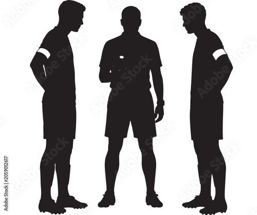 Soccer referee silhouette stands between two players on the field while officiating a professional match during a competitive tournament game.