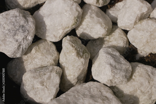 Photos Pile of Rough off-white Gray Stones and Rocks Top Down View Natural Texture Mine