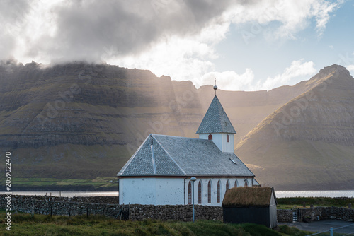 Iconic white church in Viðareiði village, Viðoy island, Faroe Islands