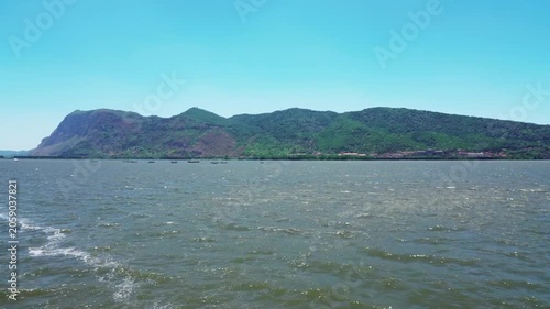 Scenic Coastal Mountain Landscape Across Calm Water
