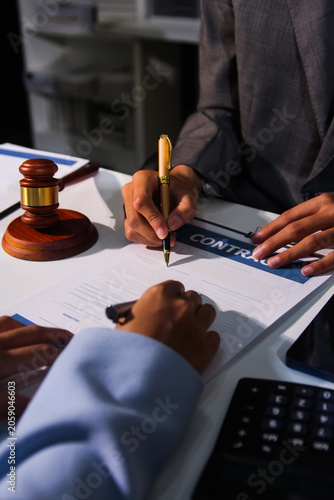 Quadro su tela Consultation and conference of professional businesswoman and Male lawyers working and discussion having at law firm in office
