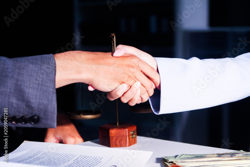 Canvas Print Consultation and conference of professional businesswoman and Male lawyers working and discussion having at law firm in office