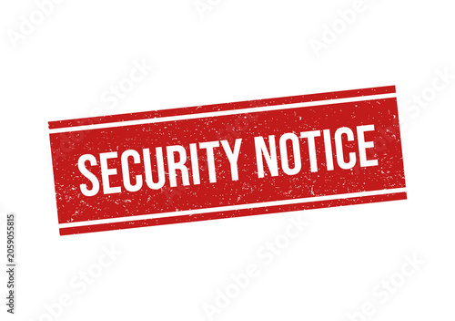 Red grunge rubber stamp impression with the text security notice