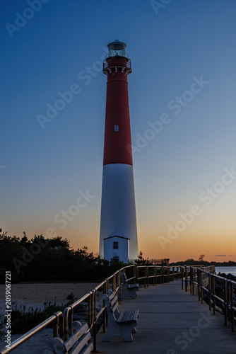 Barnegat Lighthouse at twilight with boardwalk, New Jersey