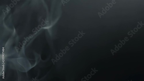 Smoke billows and swirls in a dark background, creating an ethereal atmosphere with gradual movement and changing shapes throughout the sequence of frames