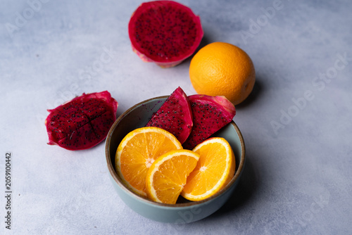 Fresh Dragon Fruit and Orange Slices on Decorative Plate